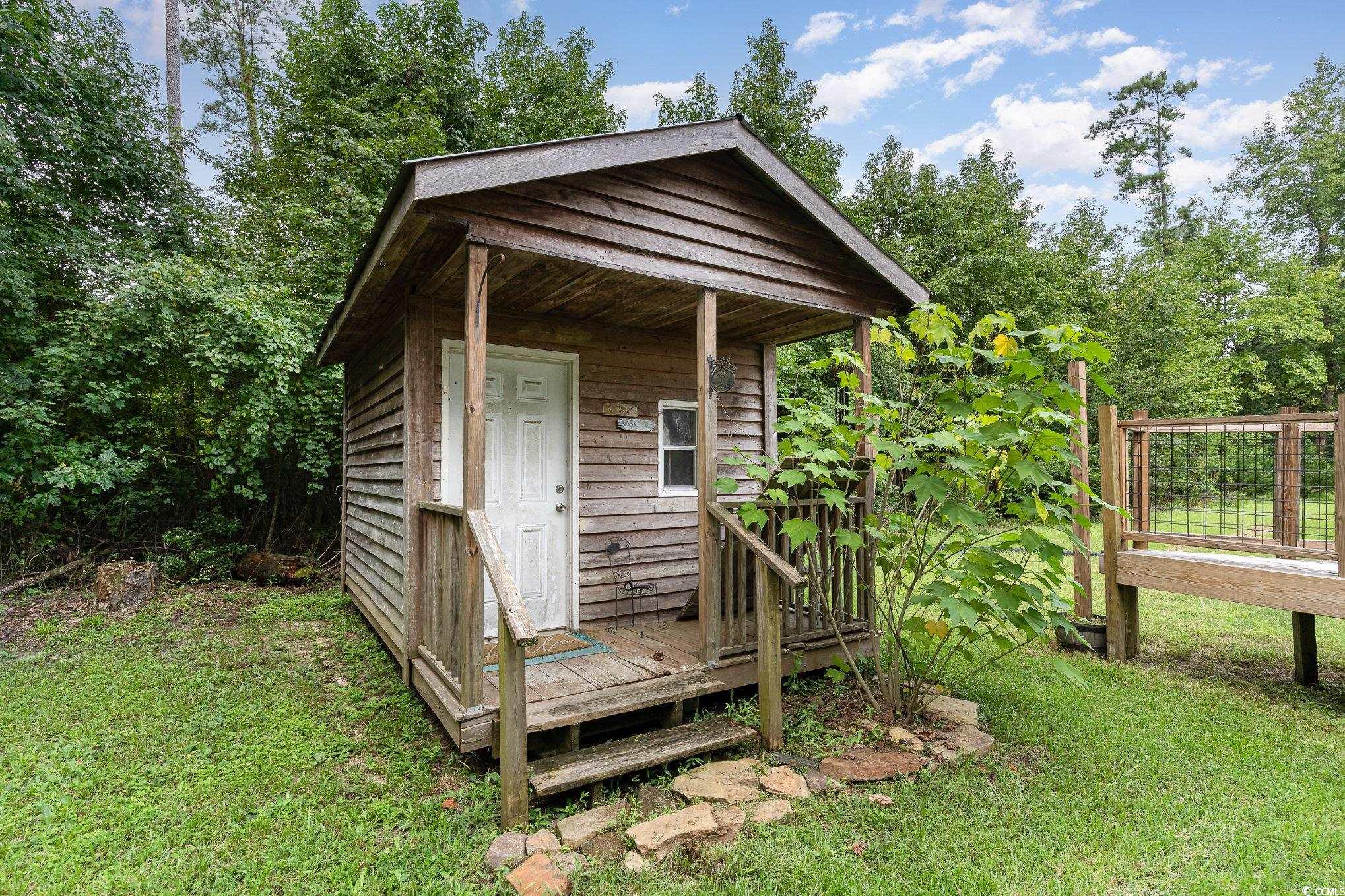 1359 Rodney Road Conway, SC 29526 - Photo 36 of 40 View of outdoor structure featuring a yard
