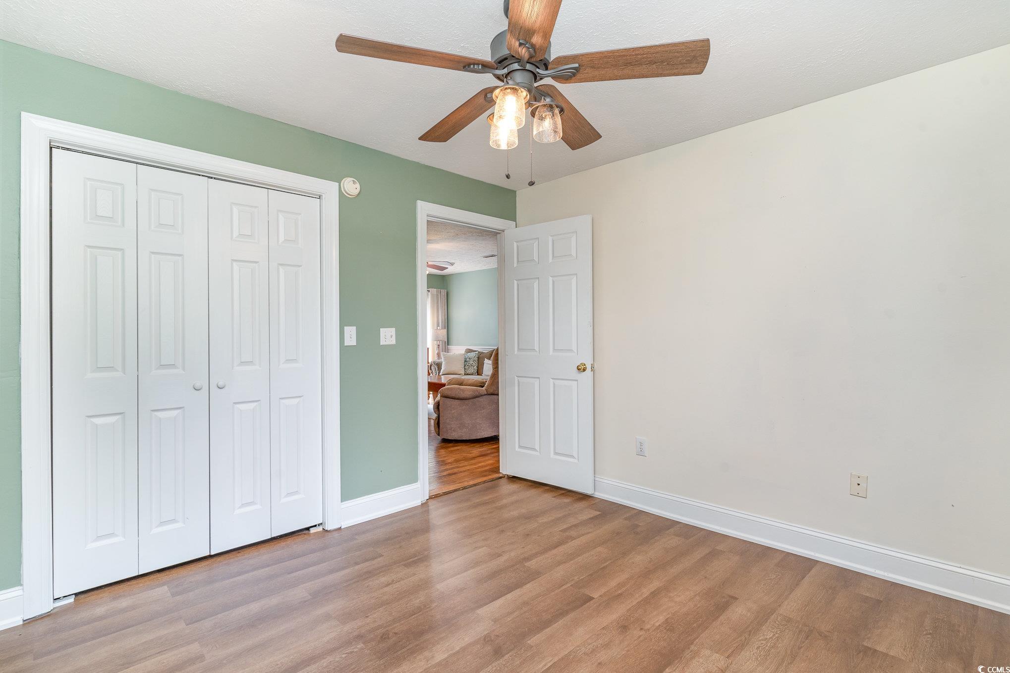 1359 Rodney Road Conway, SC 29526 - Photo 4 of 40 Unfurnished bedroom with ceiling fan, light wood-t