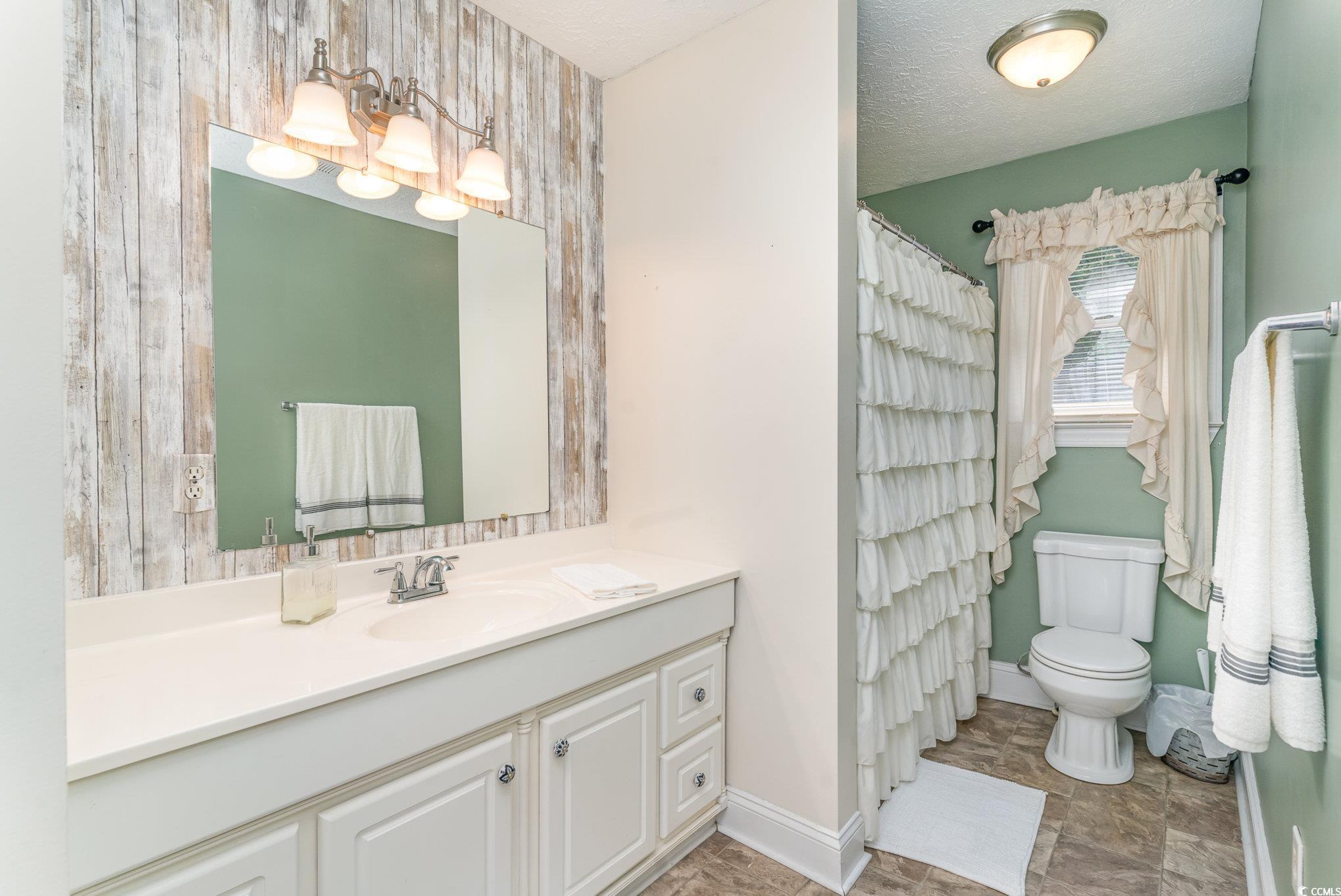 1359 Rodney Road Conway, SC 29526 - Photo 5 of 40 Bathroom featuring tile patterned flooring, toilet