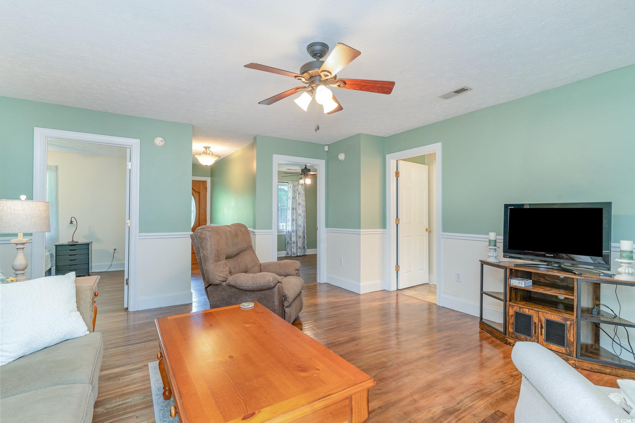 1359 Rodney Road Conway, SC 29526 - Photo 8 of 40 Living room featuring a textured ceiling, ceiling
