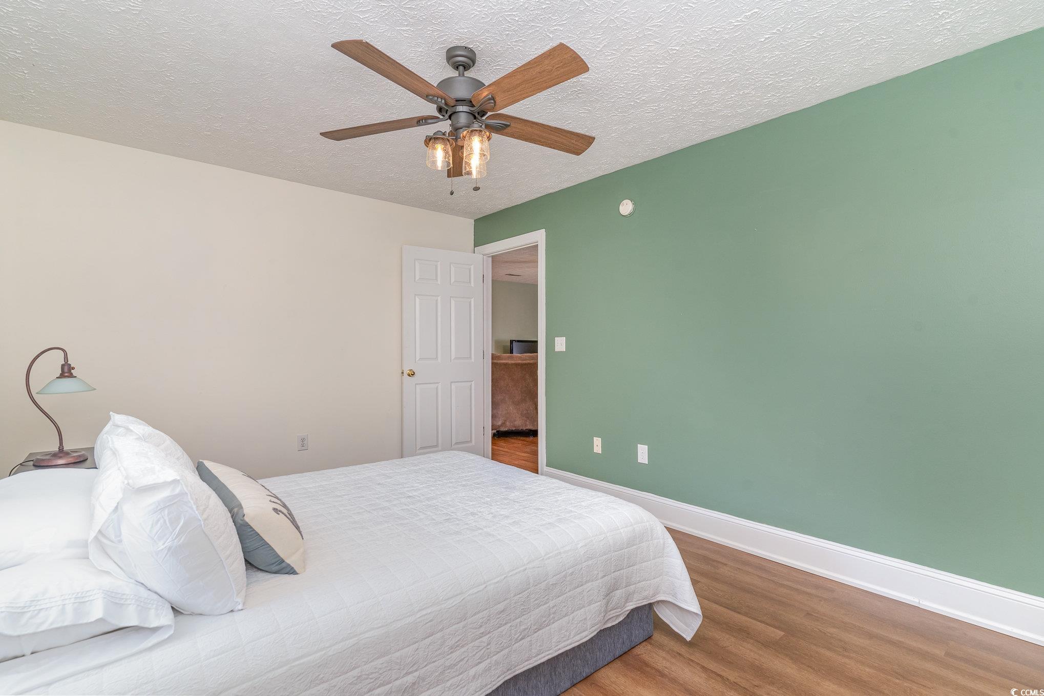 1359 Rodney Road Conway, SC 29526 - Photo 10 of 40 Bedroom featuring a textured ceiling, ceiling fan,