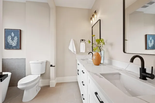 a bathroom with a bathtub and window