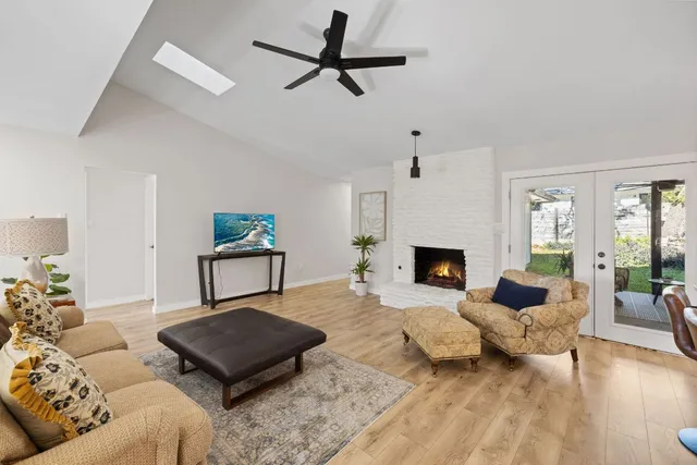 a living room with furniture or couch and a fireplace