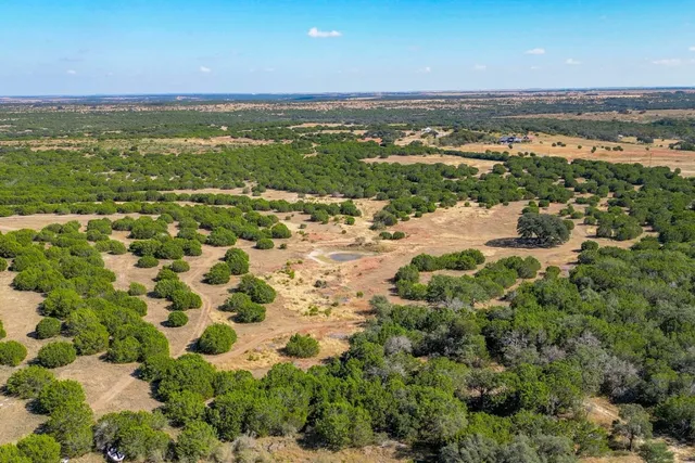 a view of a city with an ocean