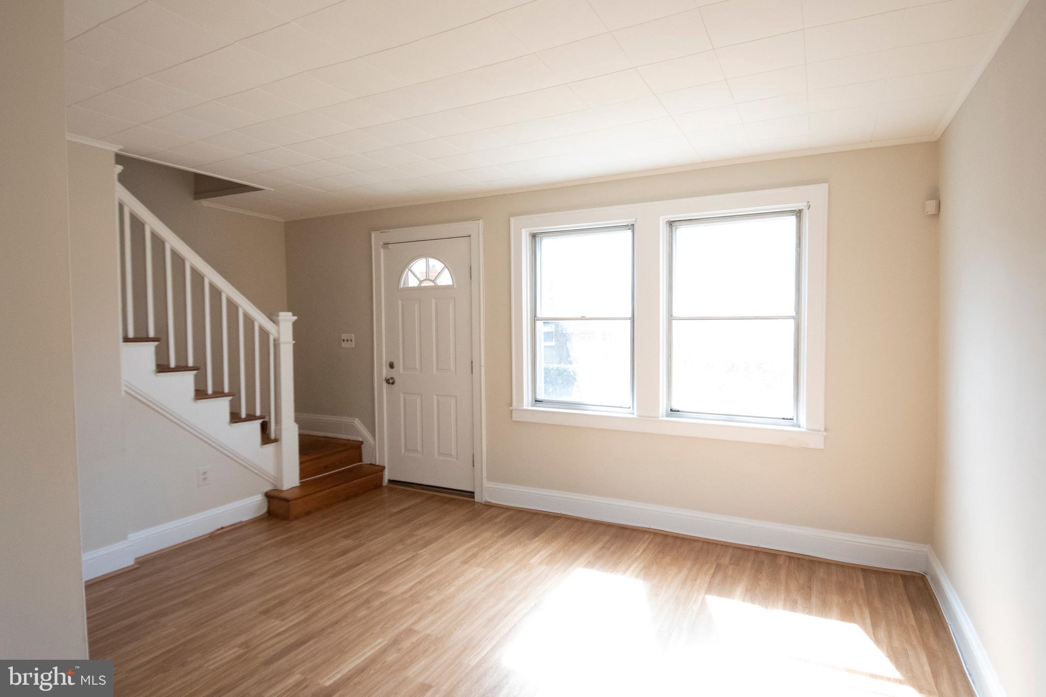 7038 Dunbar Road Baltimore, MD 21222 - Photo 7 of 33 First floor living room