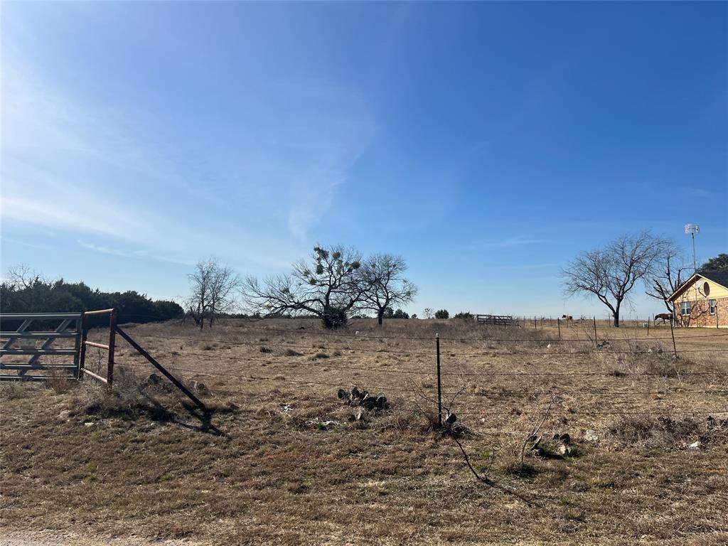 377 County Road 243 Hico, TX 76457 - Photo 10 of 11 a view of a dry yard with wooden fence