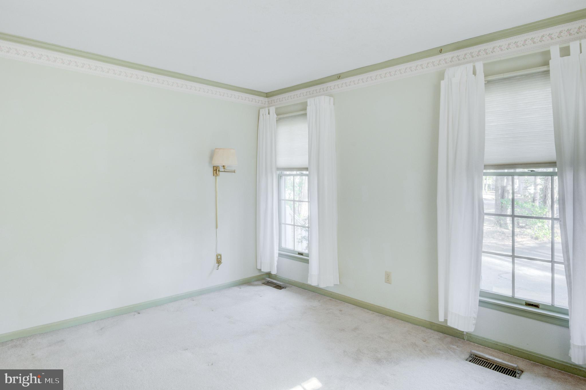 16 Canal Road Ocean Pines, MD 21811 - Photo 11 of 56 a view of an empty room with a window
