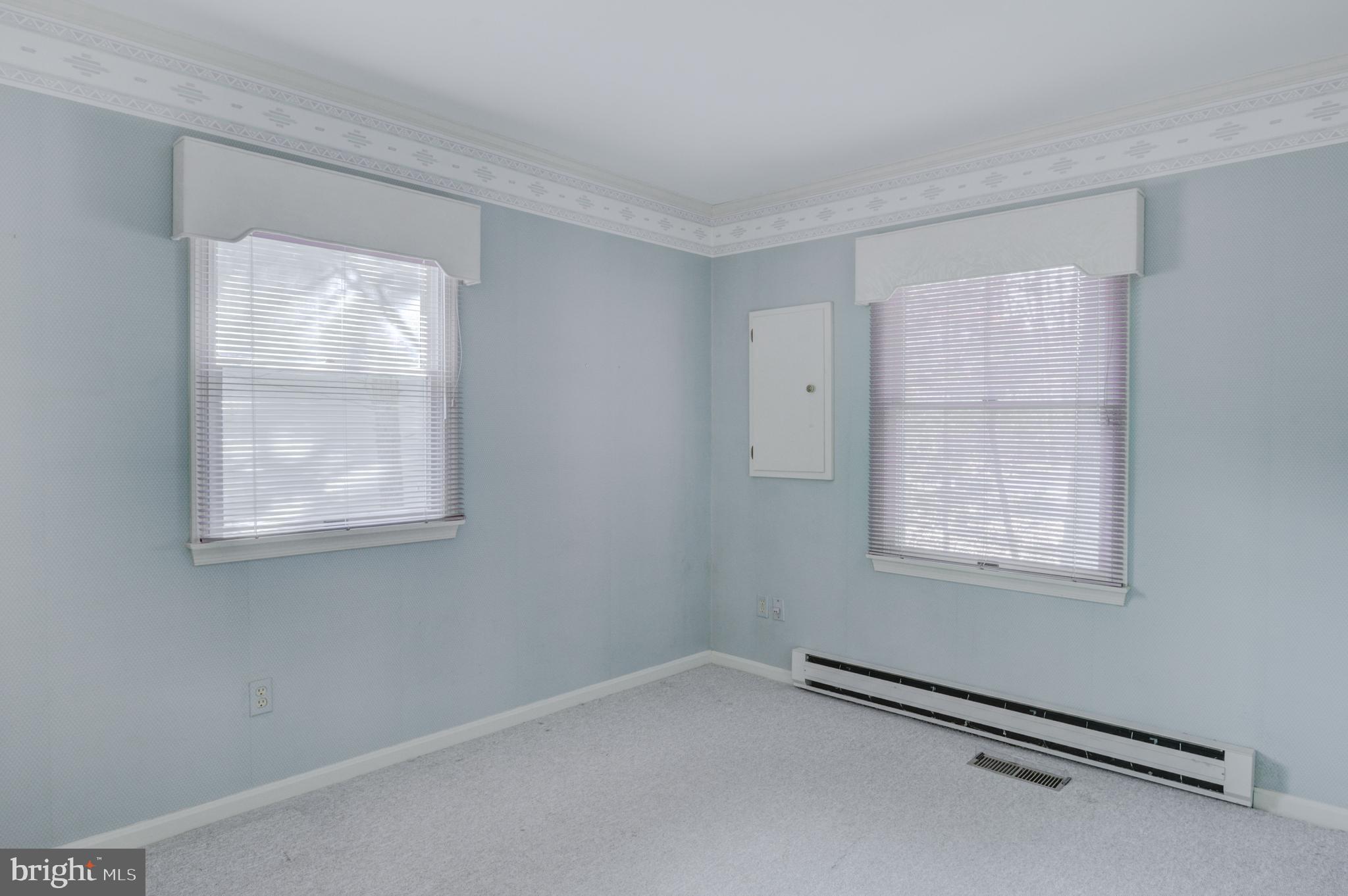16 Canal Road Ocean Pines, MD 21811 - Photo 22 of 56 an empty room with windows