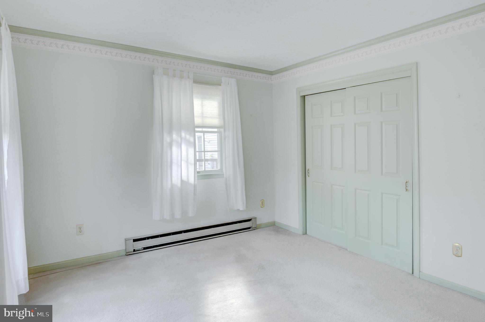 16 Canal Road Ocean Pines, MD 21811 - Photo 23 of 56 an empty room with windows