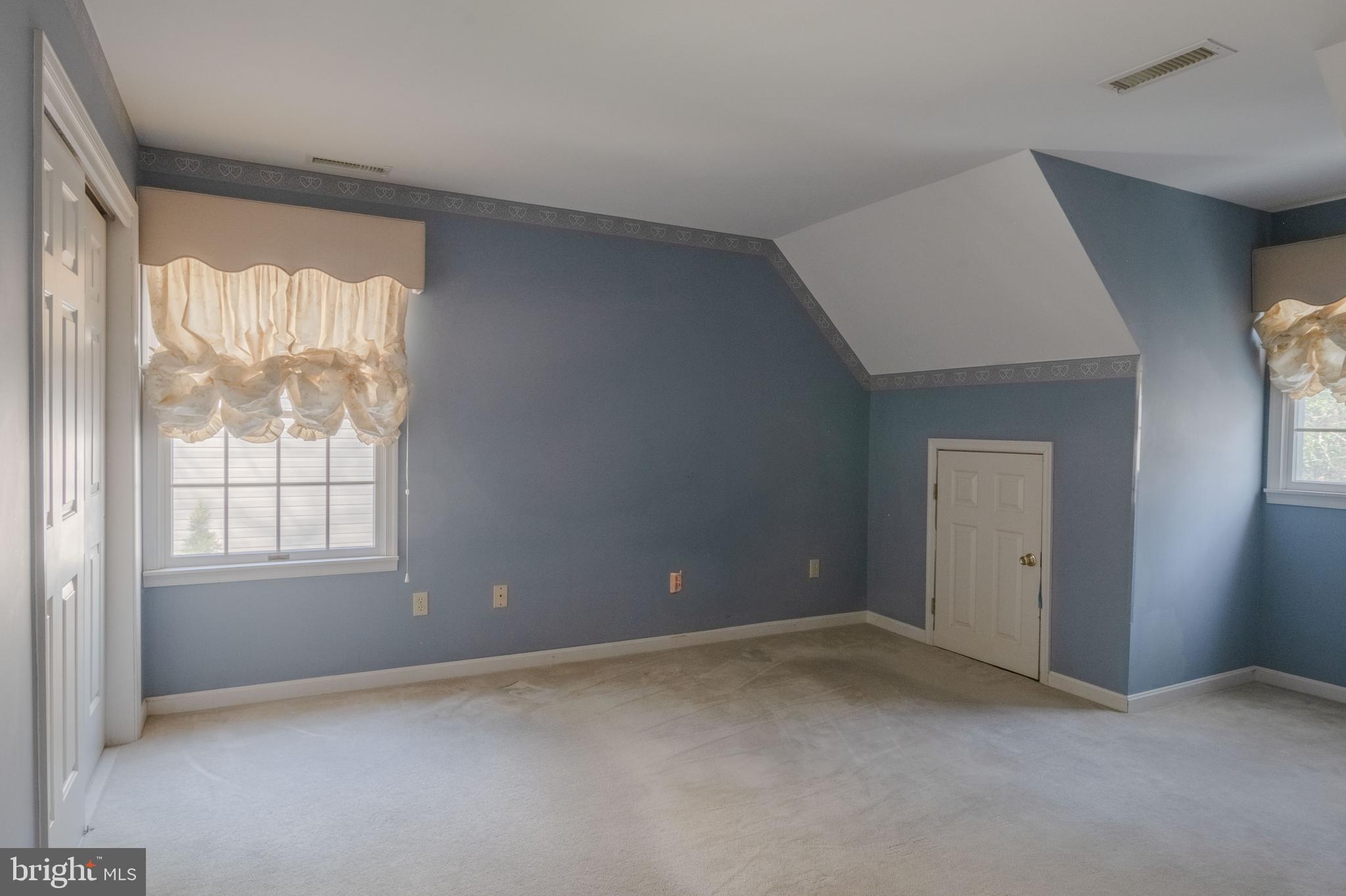 16 Canal Road Ocean Pines, MD 21811 - Photo 33 of 56 an empty room with windows and closet