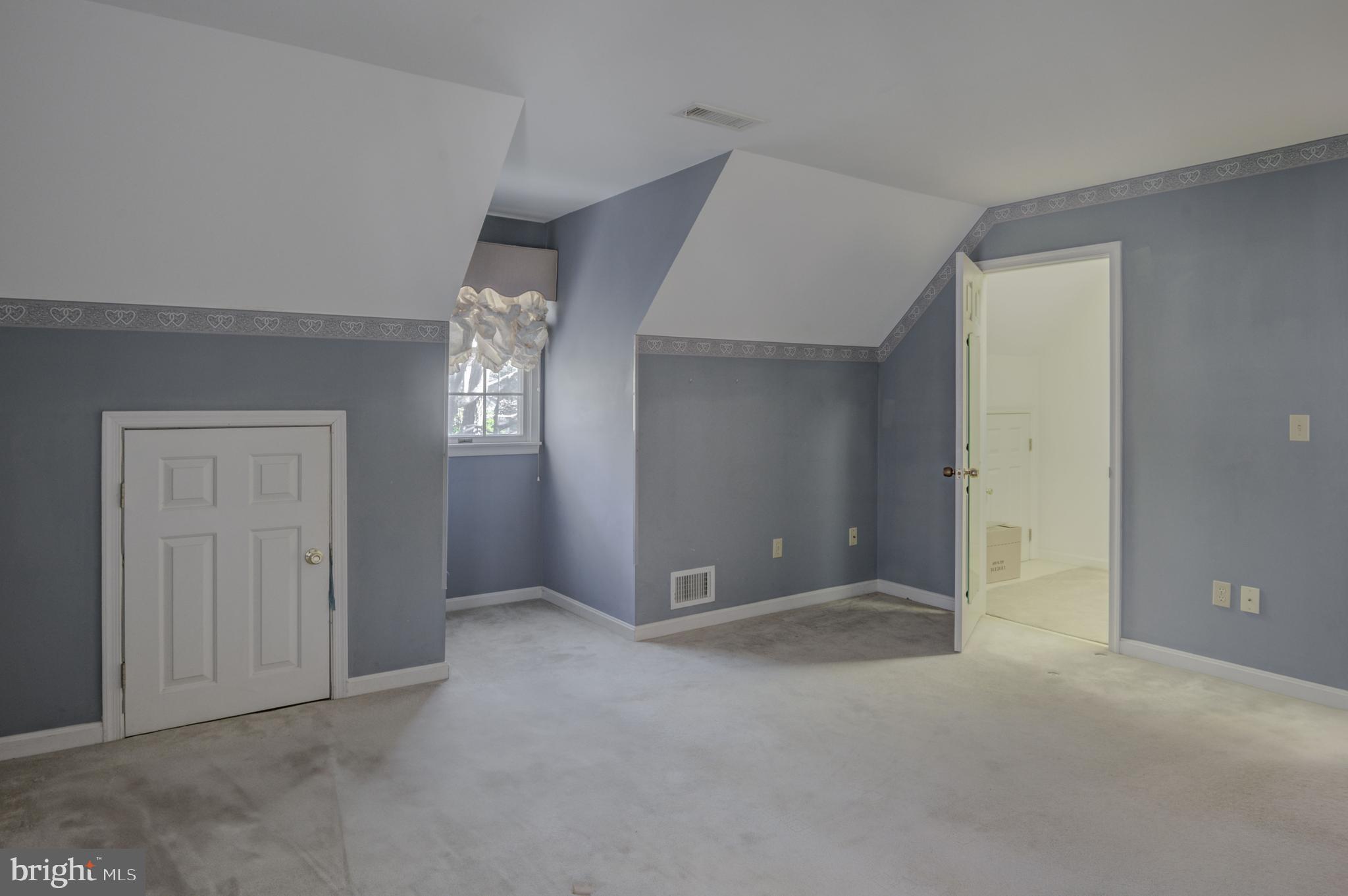 16 Canal Road Ocean Pines, MD 21811 - Photo 34 of 56 an empty room with windows and closet