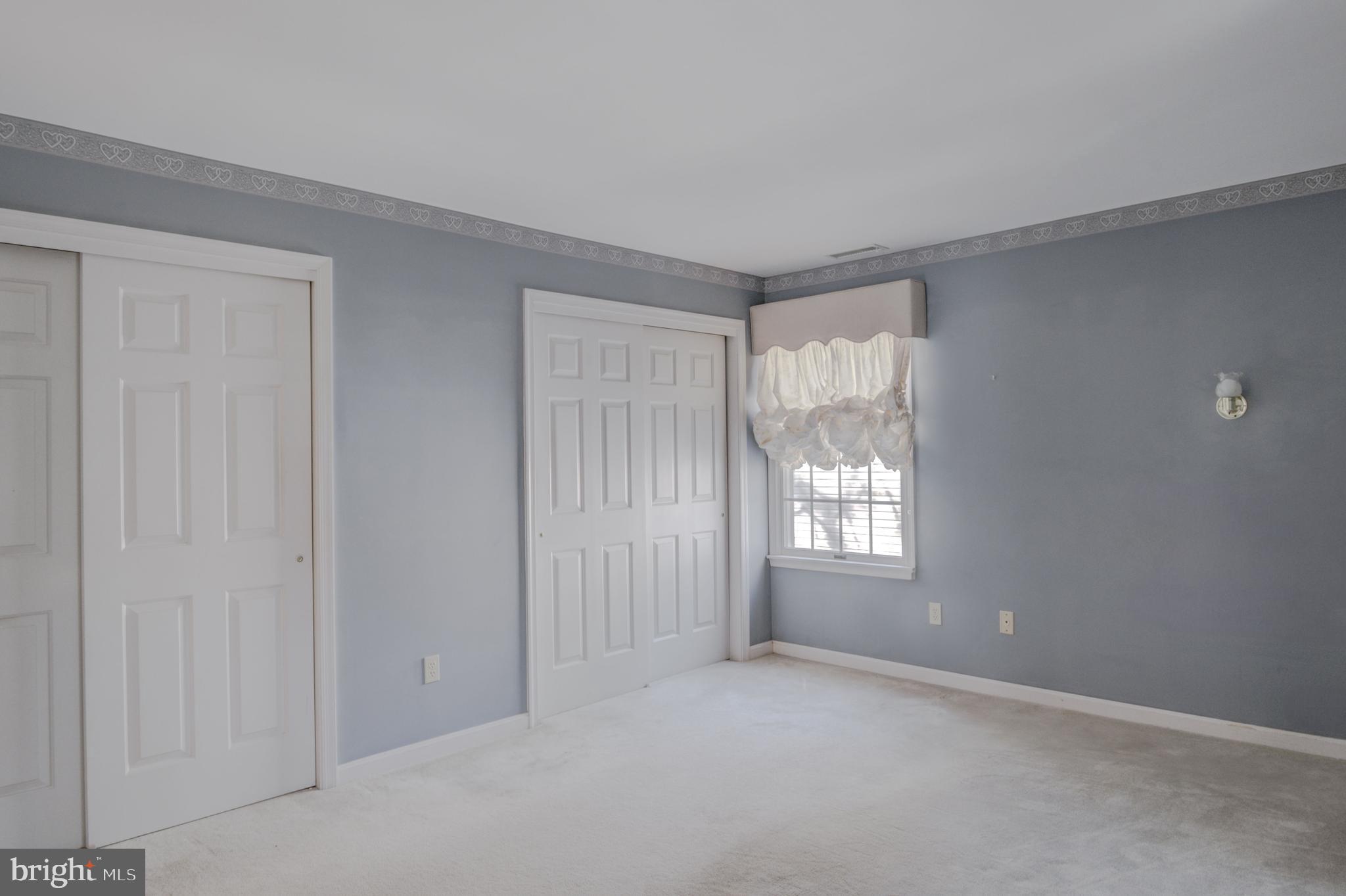 16 Canal Road Ocean Pines, MD 21811 - Photo 36 of 56 a view of an empty room with window and bathroom