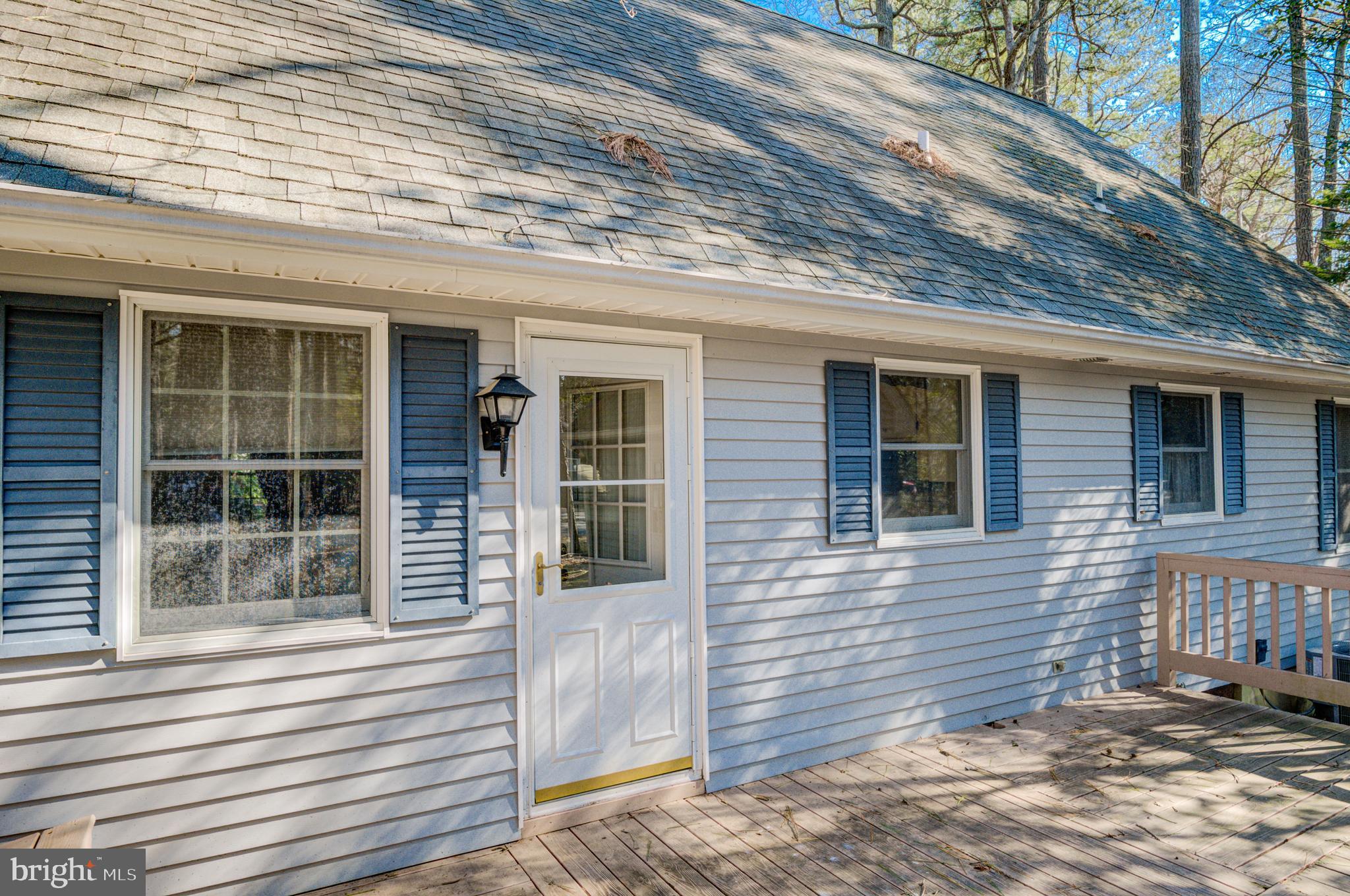 16 Canal Road Ocean Pines, MD 21811 - Photo 40 of 56 a view of a house with a yard