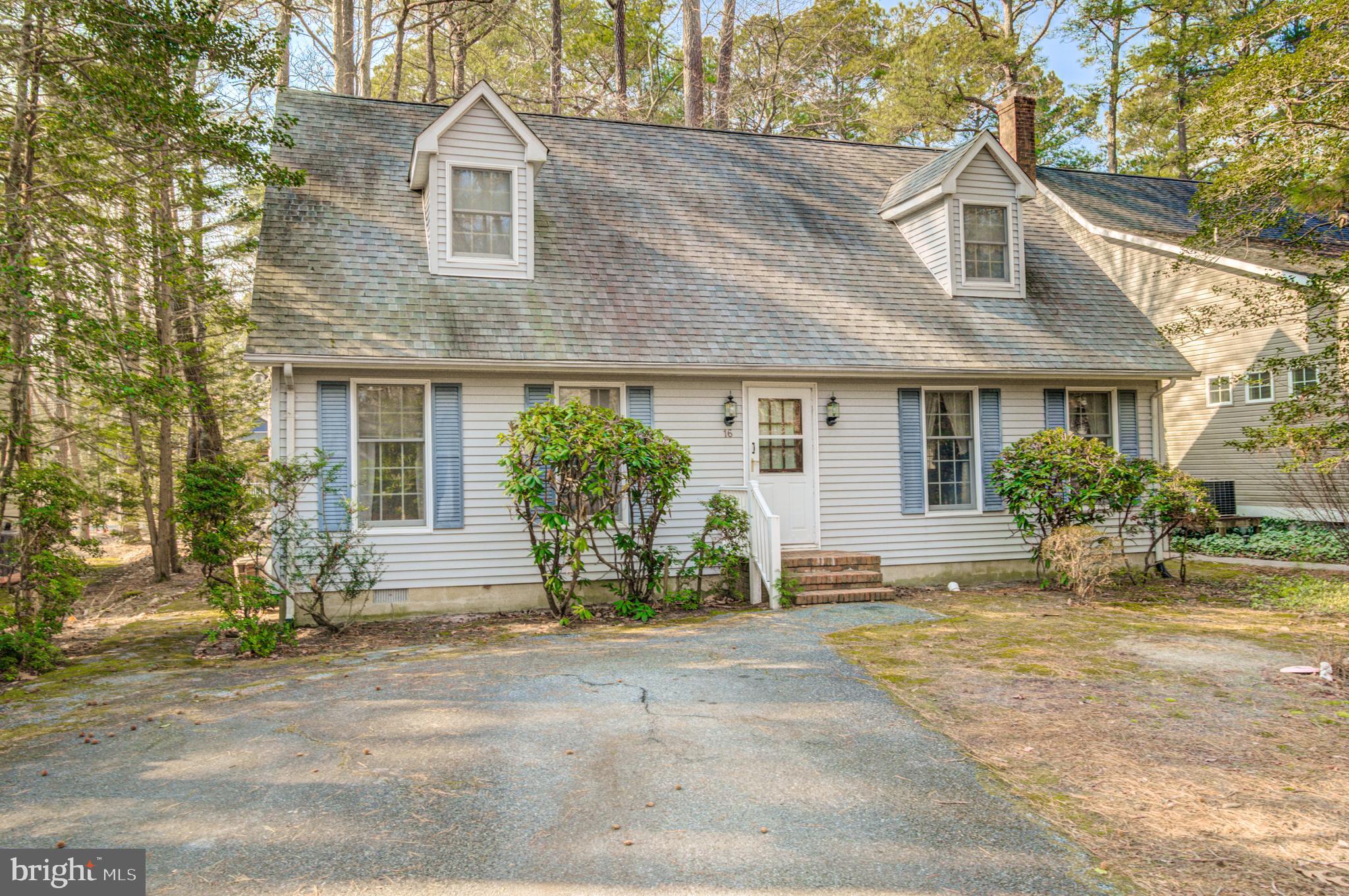 16 Canal Road Ocean Pines, MD 21811 - Photo 55 of 56 front view of a house with a patio