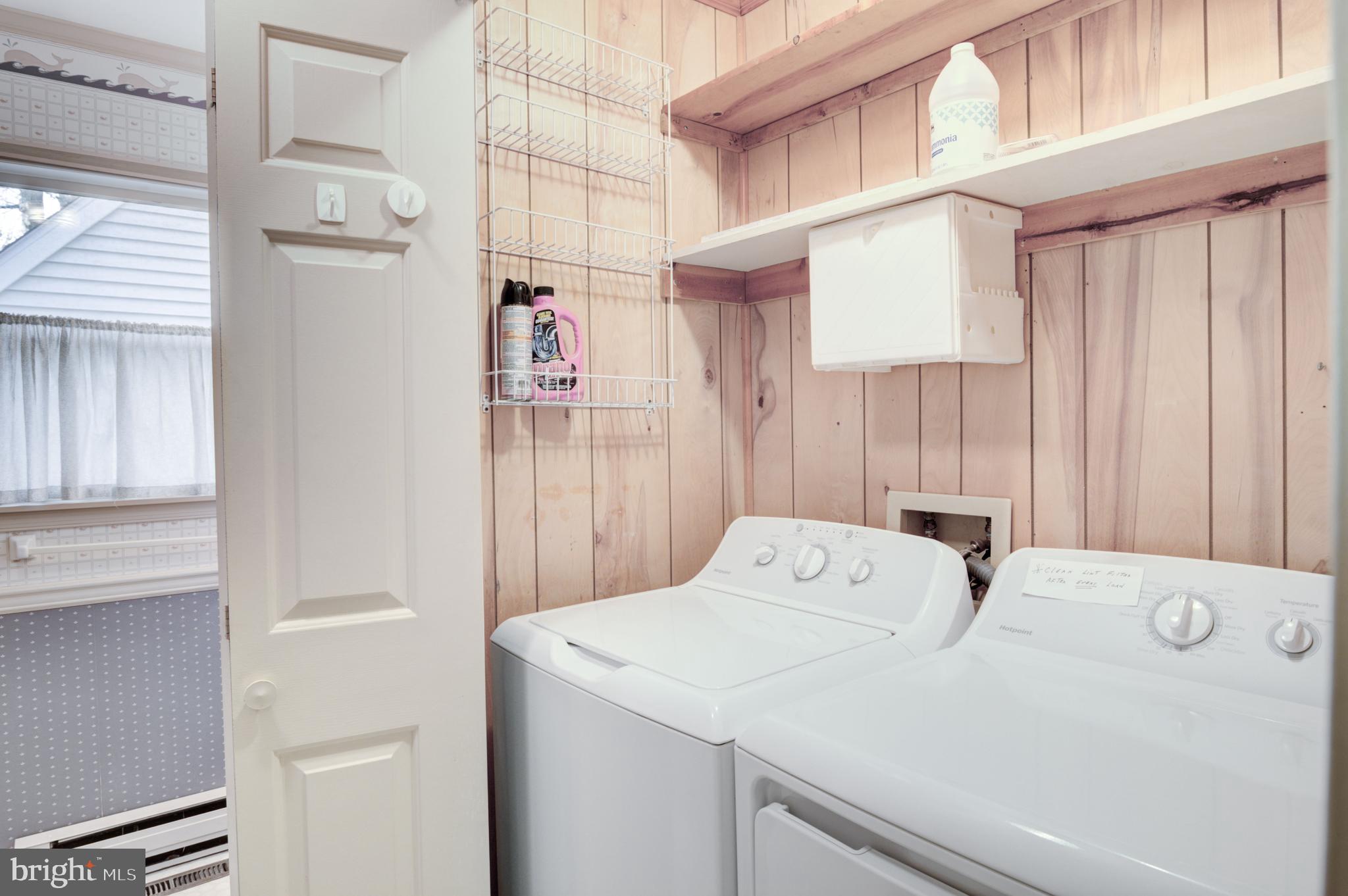 16 Canal Road Ocean Pines, MD 21811 - Photo 10 of 56 a utility room with dryer and washer