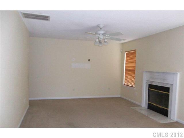 10807 Azure Valley Place Charlotte, NC 28269 - Photo 3 of 13 a view of an empty room with a window