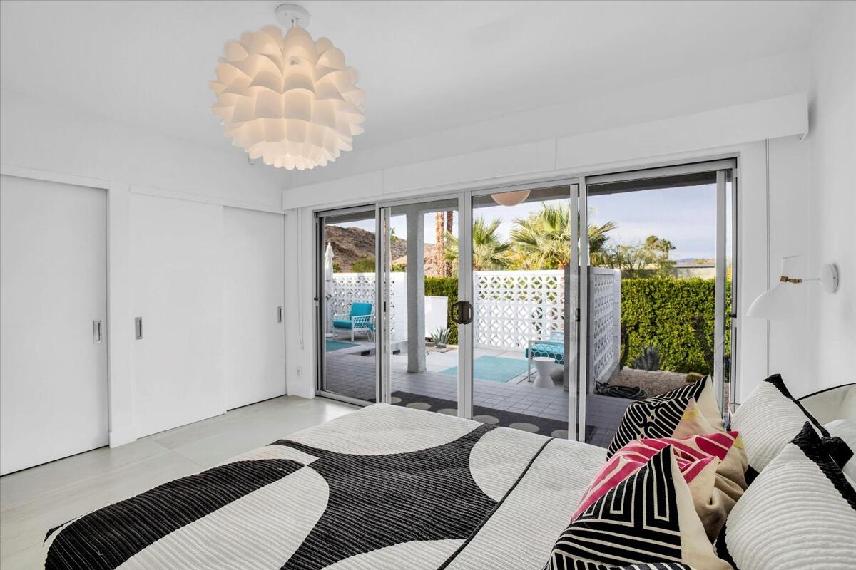 68159 Mountain View Road Cathedral City, CA 92234 - Photo 45 of 77 a living room with furniture and a large window