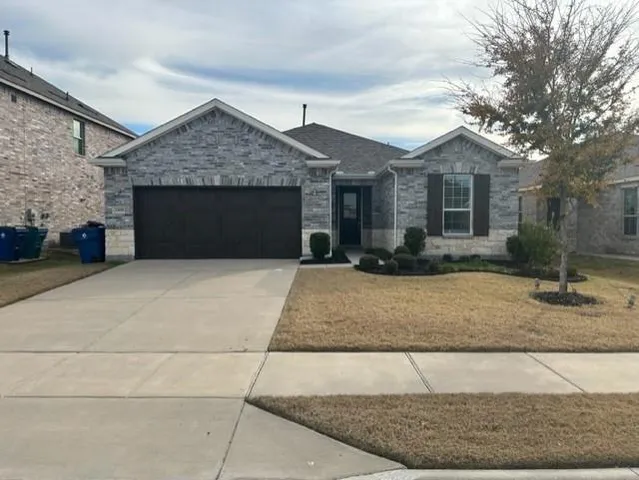 a front view of a house with entertaining space