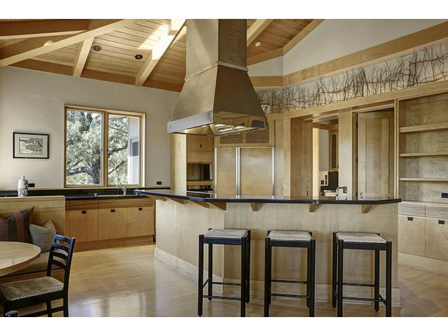 150 Farm Road Woodside, CA 94062 - Photo 9 of 19 a kitchen with stainless steel appliances granite countertop a sink and cabinets