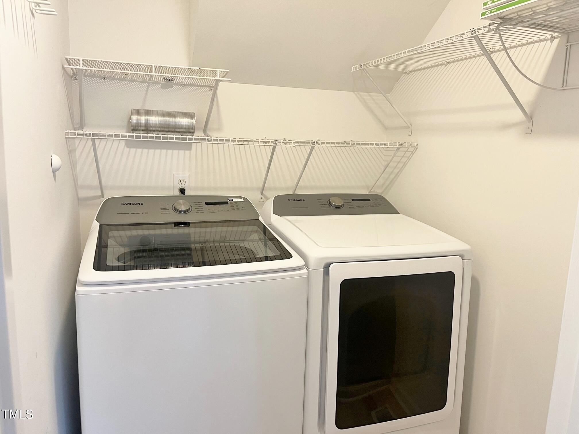 4500 Bartholomew Circle Raleigh, NC 27604 - Photo 17 of 22 a utility room with dryer and washer