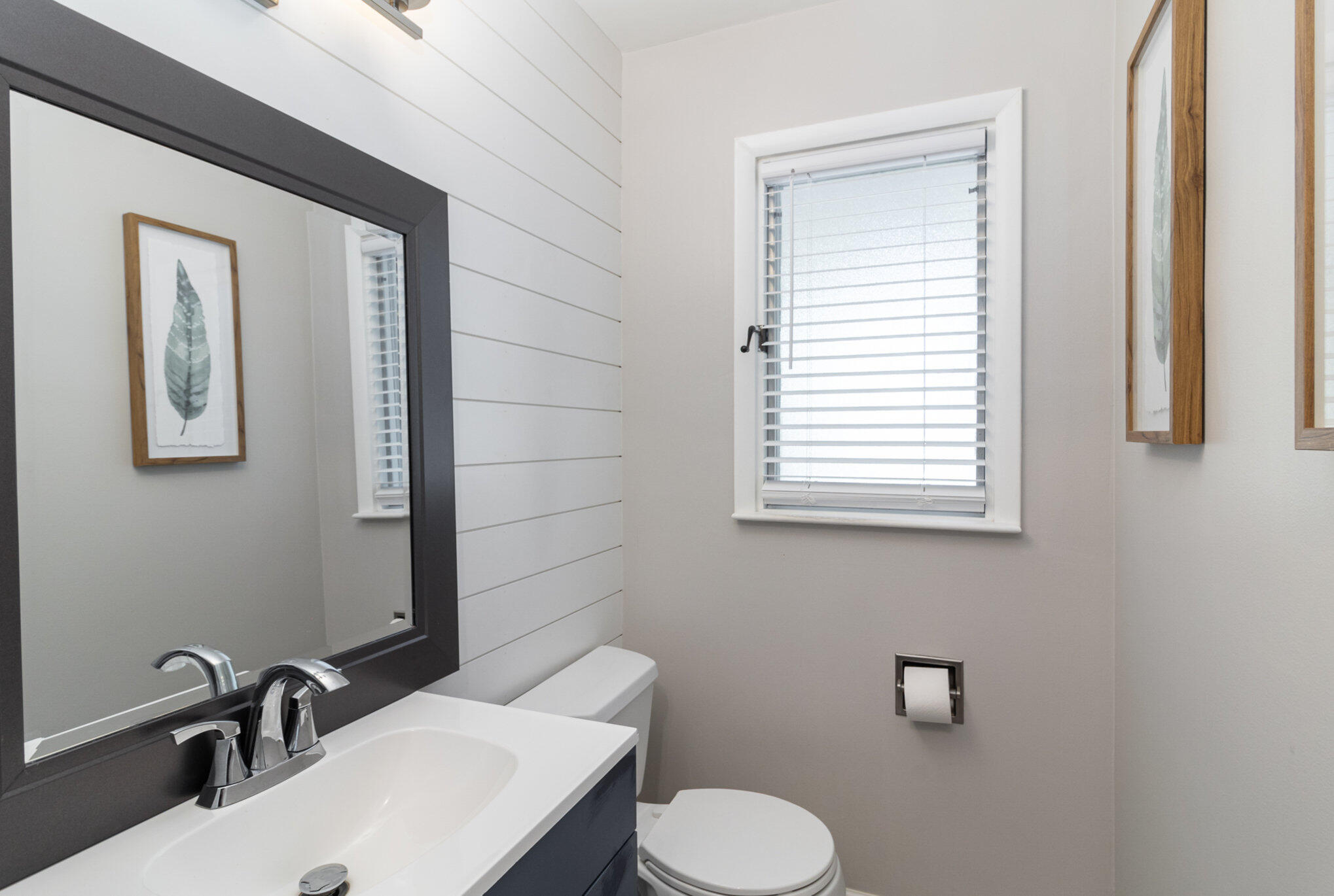 3131 Wirth Road Highland, IN 46322 - Photo 15 of 31 a bathroom with a toilet a sink and mirror