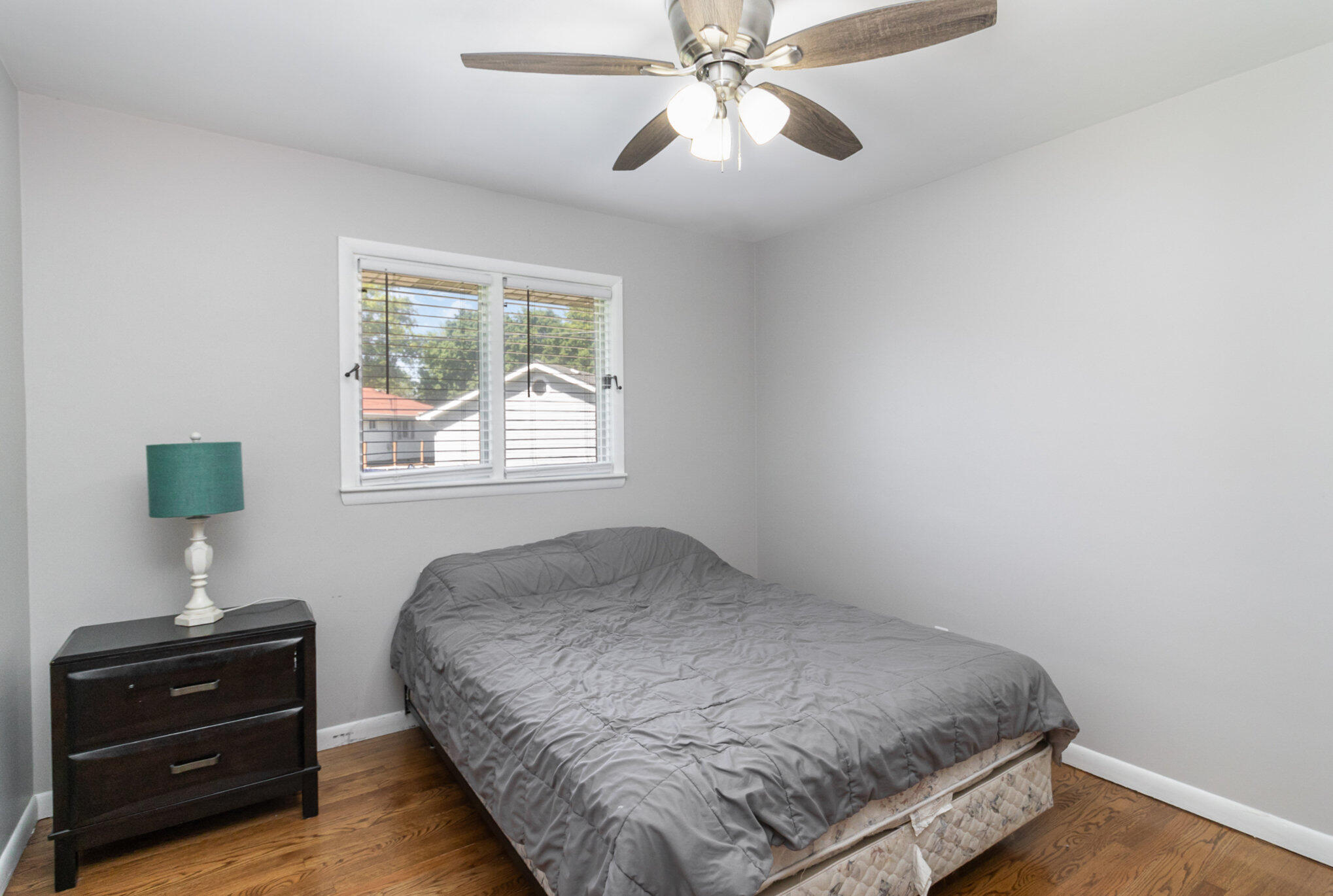 3131 Wirth Road Highland, IN 46322 - Photo 18 of 31 a bedroom with a bed and a window