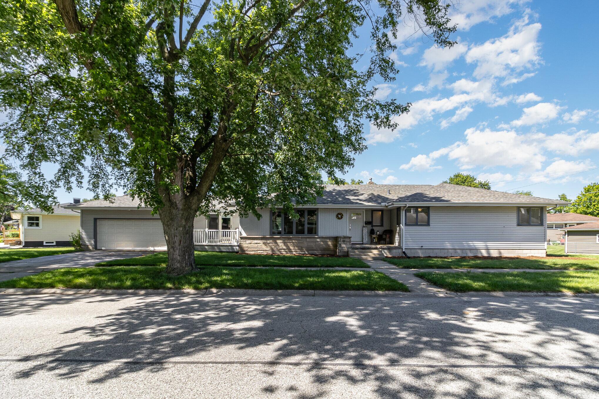 3131 Wirth Road Highland, IN 46322 - Photo 2 of 31 a front view of a house with garden