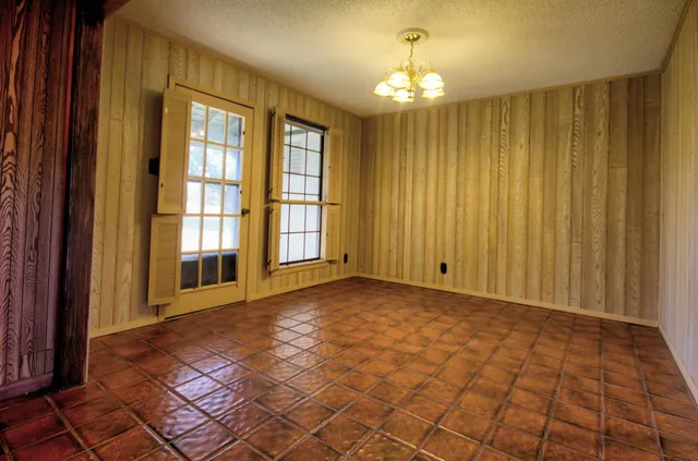 a view of a room with windows