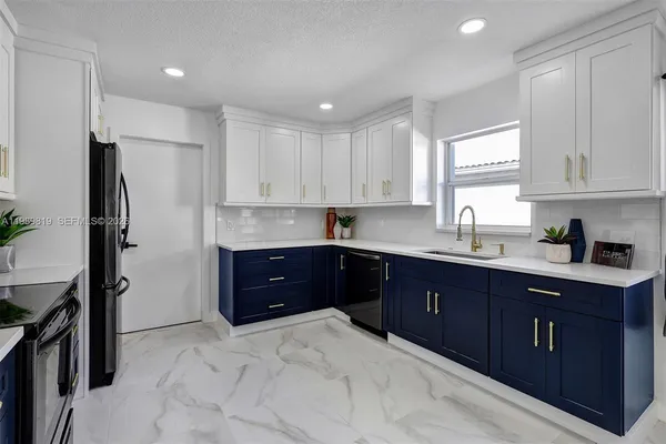 $555,000 | 104 Wedgewood Lakes South, Greenacres, FL 33463