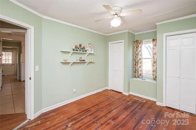a view of room with hardwood floor