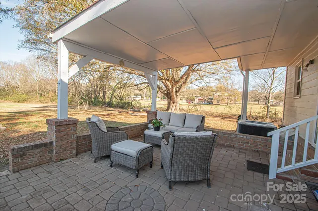 a outdoor space with patio the couches and ocean view