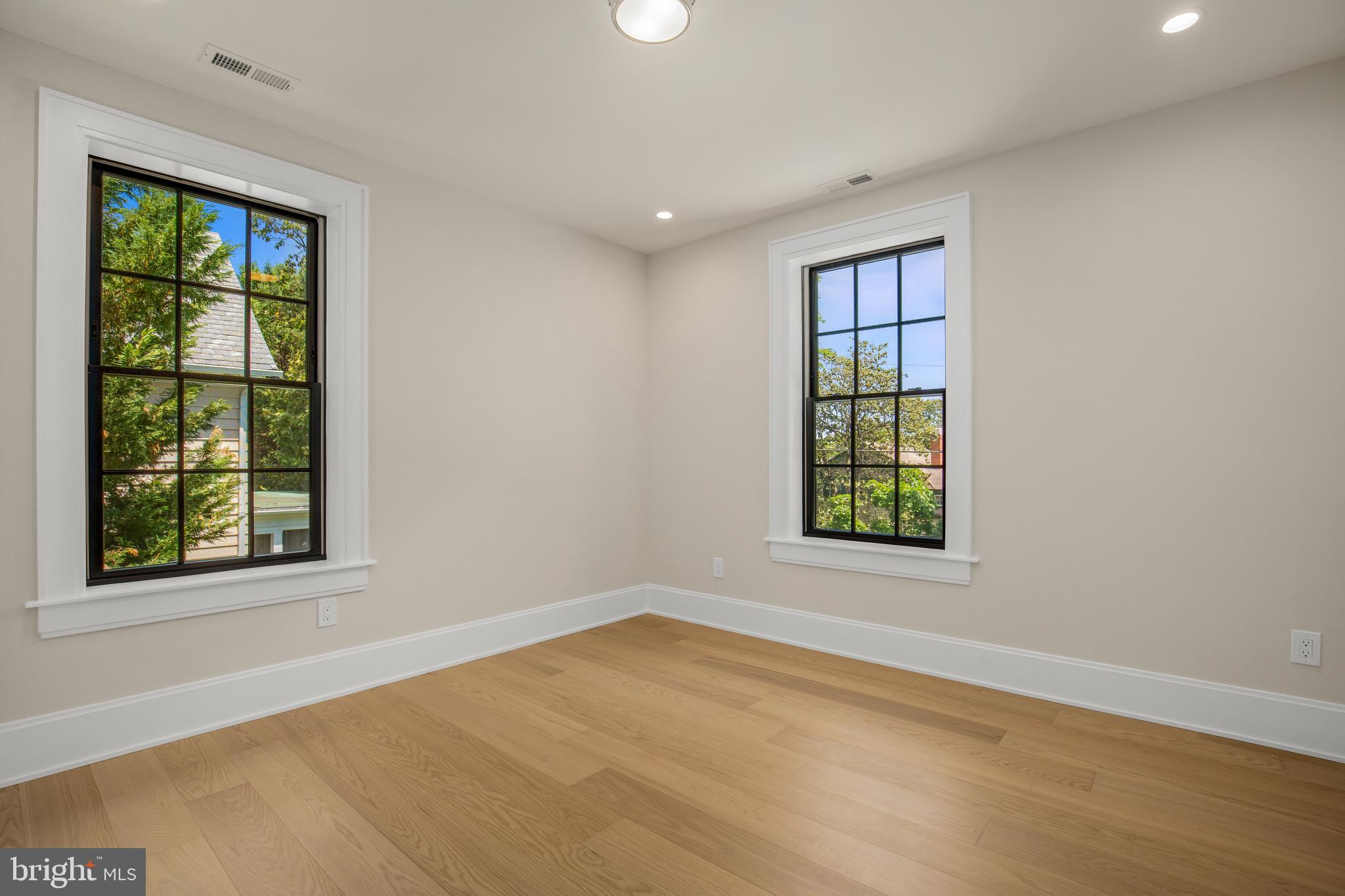 2710 36th Street Northwest Washington, DC 20007 - Photo 18 of 29 an empty room with a window