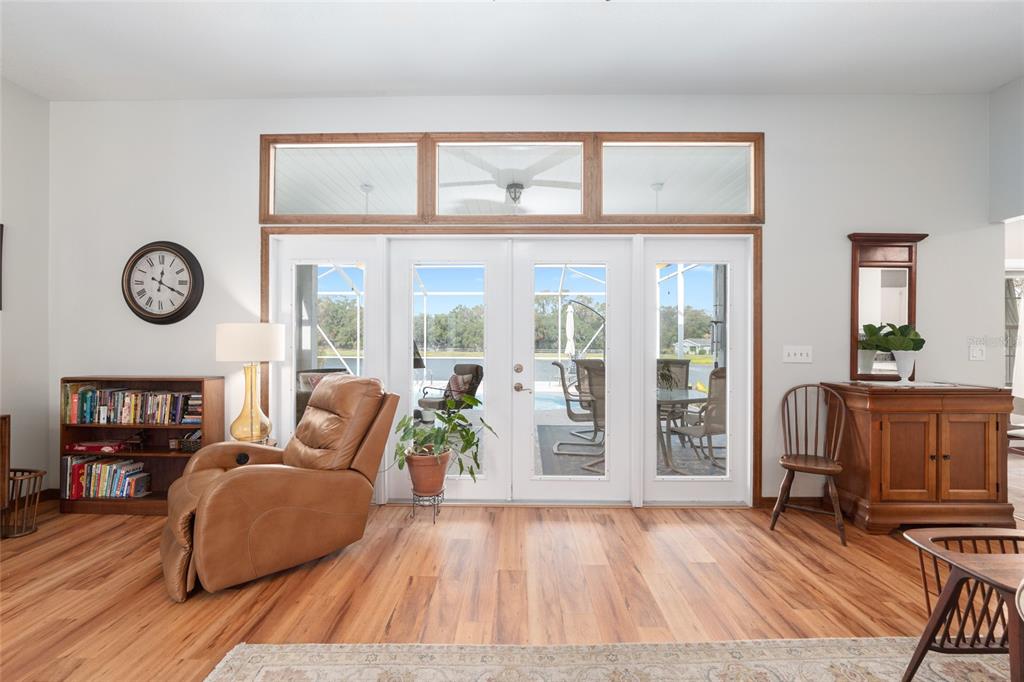 12094 Southeast 60th Avenue Road Belleview, FL 34420 - Photo 15 of 74 a living room with furniture and a large window