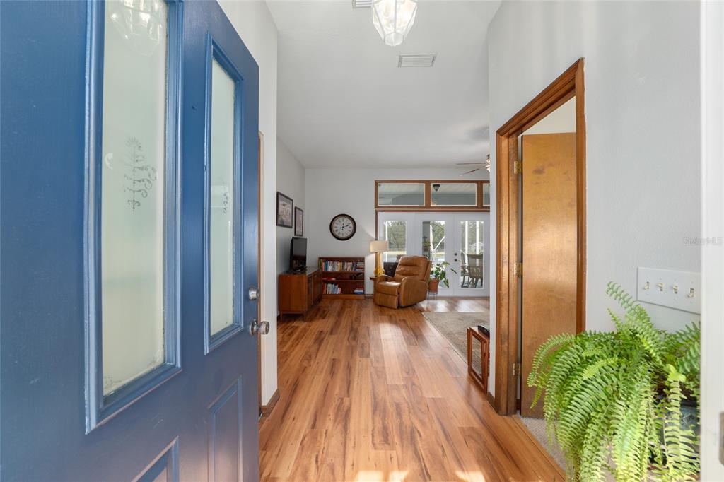12094 Southeast 60th Avenue Road Belleview, FL 34420 - Photo 8 of 74 a view of a living room and dining room
