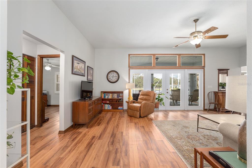12094 Southeast 60th Avenue Road Belleview, FL 34420 - Photo 10 of 74 a living room with furniture and a large window