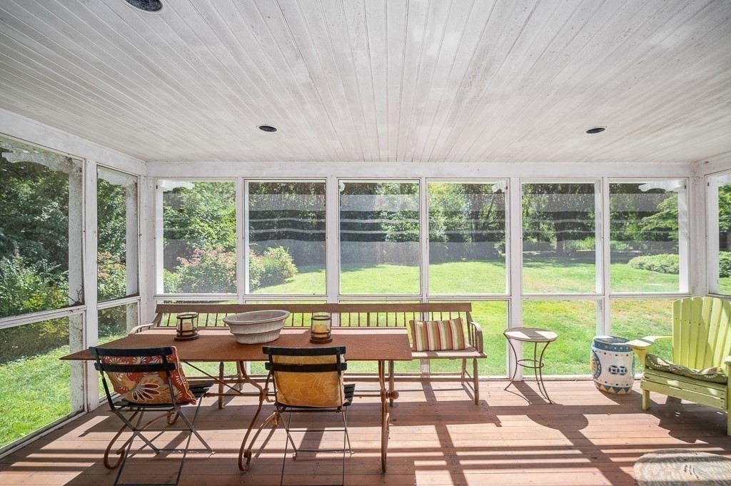 172 Argilla Road Ipswich, MA 01938 - Photo 21 of 34 a view of a living room and floor to ceiling window