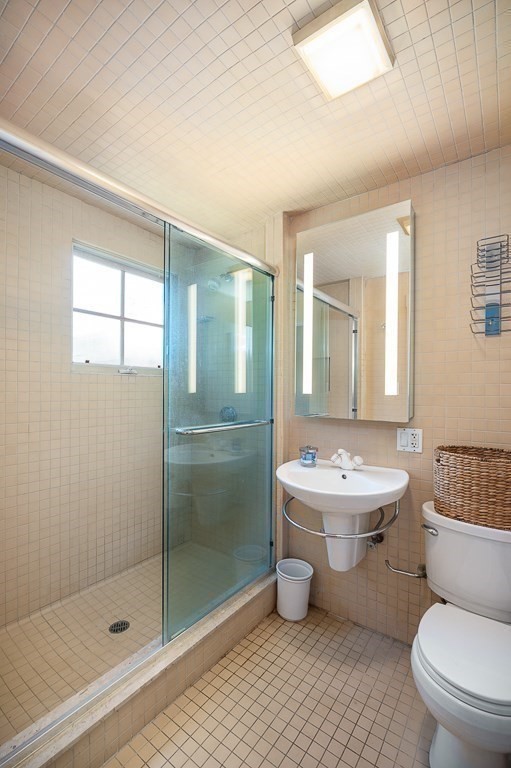 172 Argilla Road Ipswich, MA 01938 - Photo 30 of 34 a bathroom with a toilet a sink and mirror