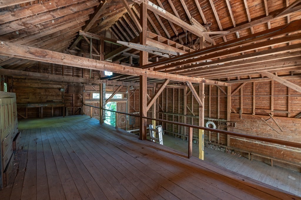172 Argilla Road Ipswich, MA 01938 - Photo 32 of 34 a view of an empty room with wooden floor