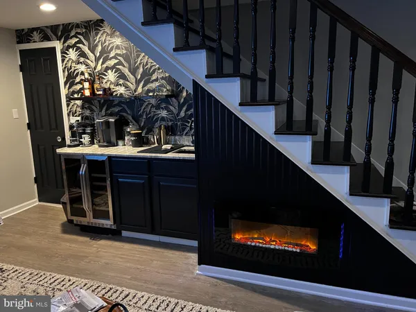 a view of a entryway door with wooden floor