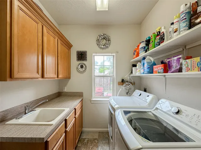 a utility room with a washer and dryer