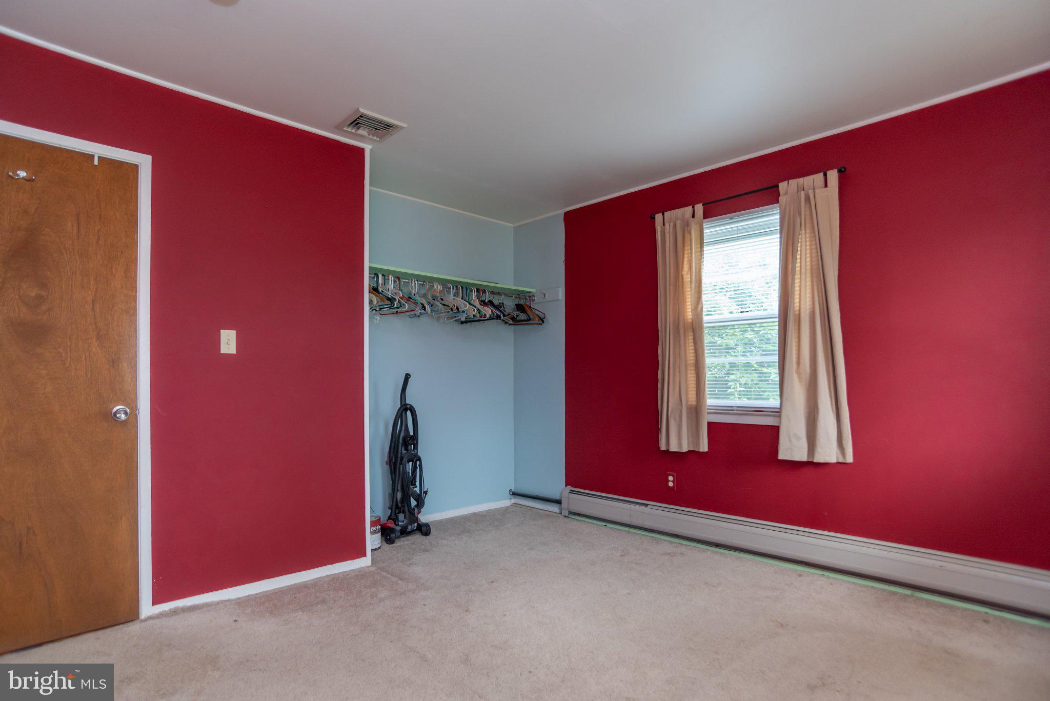 77 Cardinal Road Levittown, PA 19057 - Photo 24 of 37 a view of a livingroom with furniture and windows