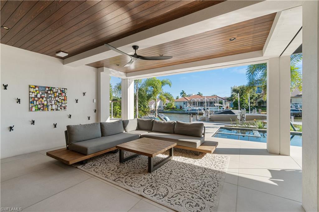 448 Oak Avenue Naples, FL 34108 - Photo 14 of 49 View of patio with outdoor lounge area
