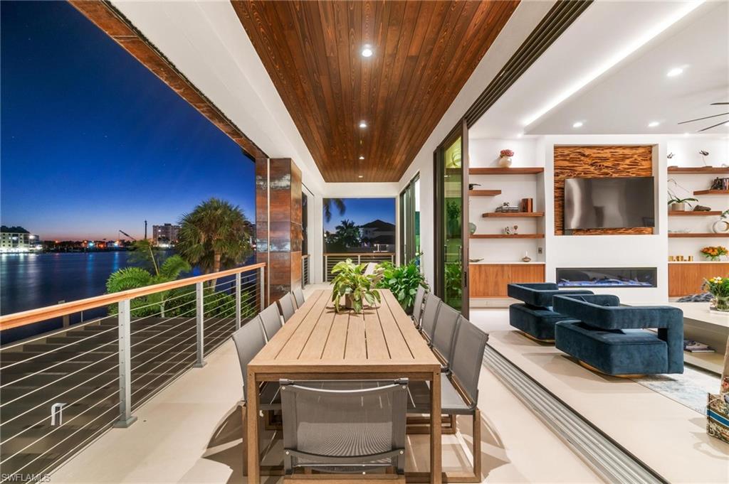 448 Oak Avenue Naples, FL 34108 - Photo 25 of 49 Home office featuring ceiling fan, a healthy amount of sunlight, and light tile patterned floors