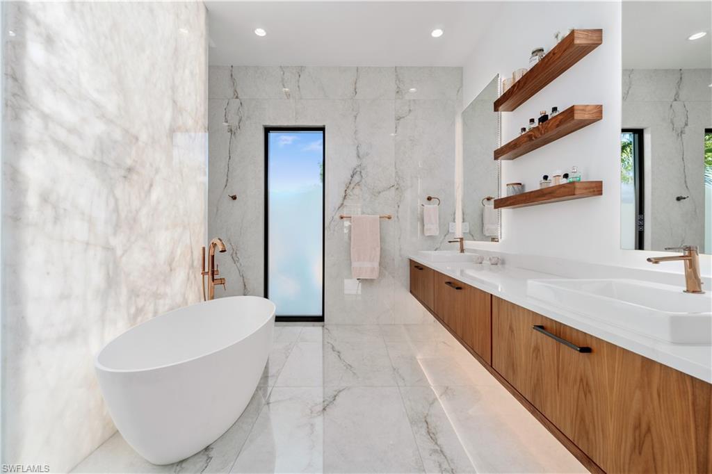 448 Oak Avenue Naples, FL 34108 - Photo 29 of 49 Balcony featuring a water view