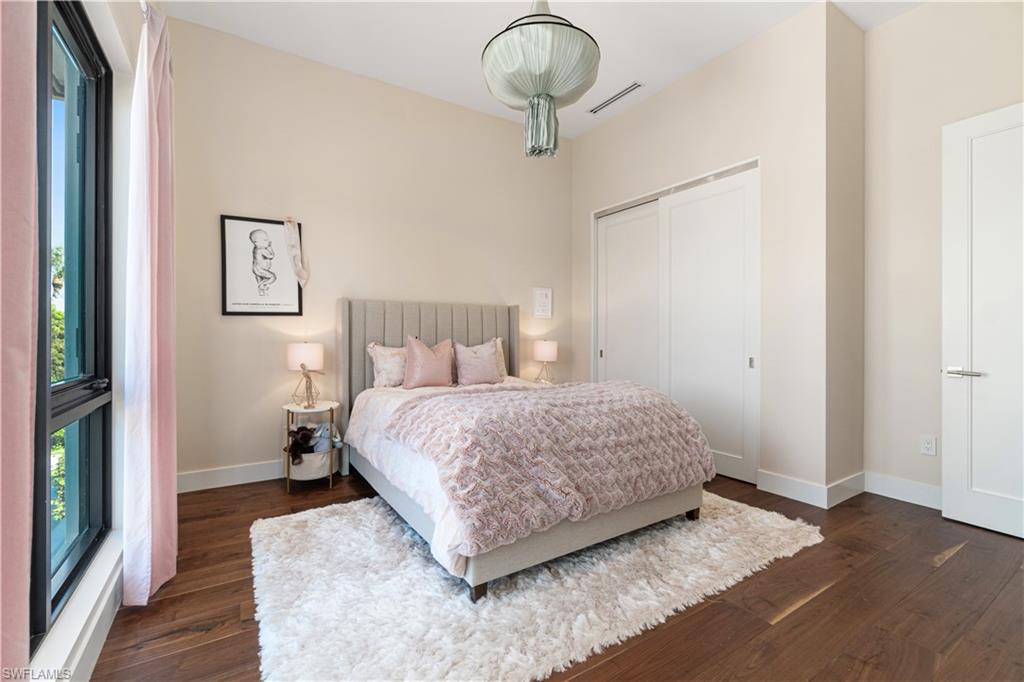 448 Oak Avenue Naples, FL 34108 - Photo 33 of 49 Bathroom featuring tile patterned floors and separate shower and tub