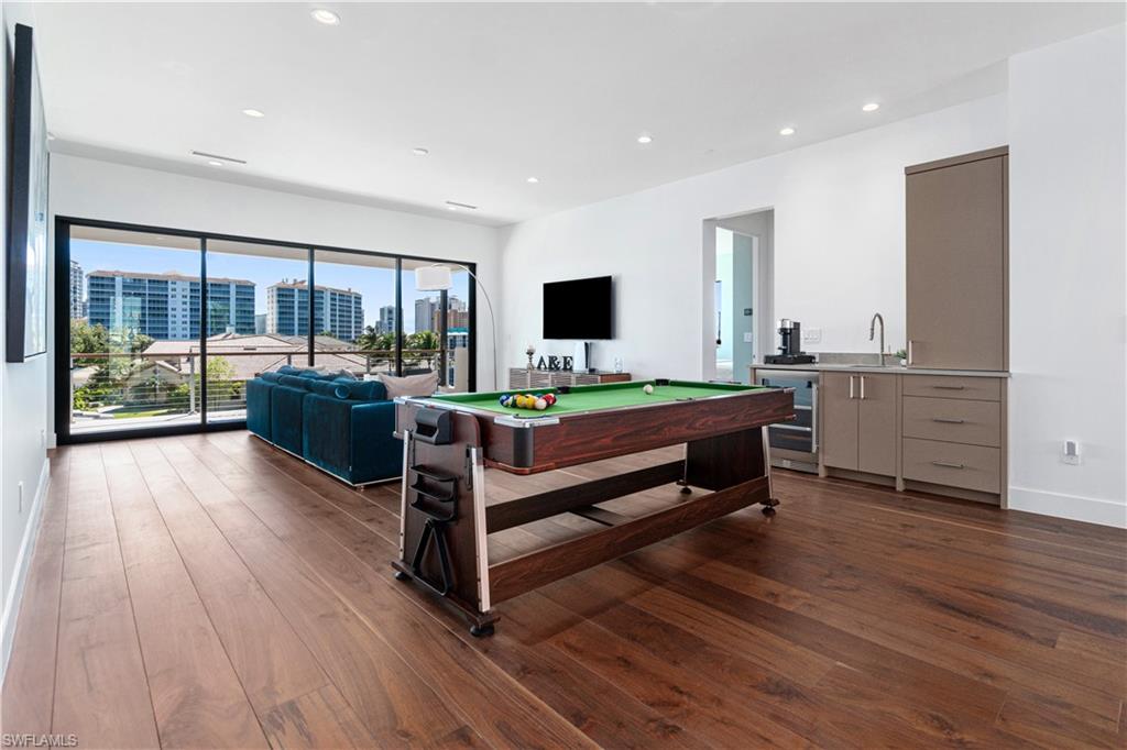 448 Oak Avenue Naples, FL 34108 - Photo 37 of 49 Office space featuring dark hardwood / wood-style flooring