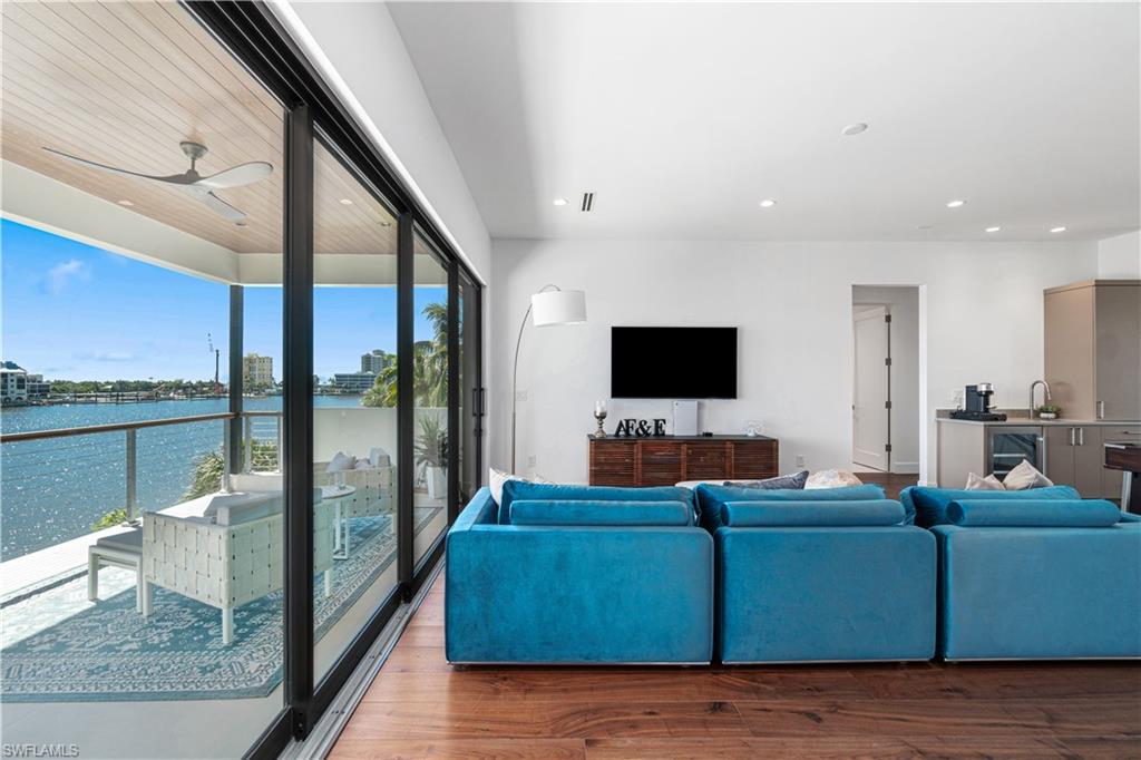 448 Oak Avenue Naples, FL 34108 - Photo 39 of 49 Living room with dark hardwood / wood-style flooring