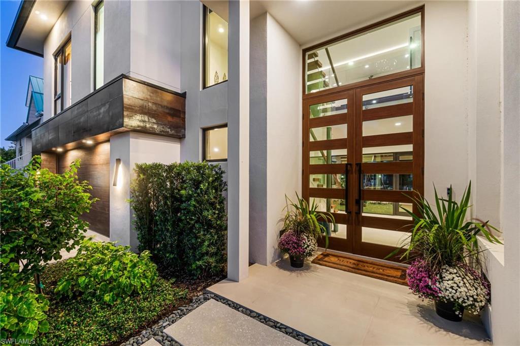 448 Oak Avenue Naples, FL 34108 - Photo 10 of 49 View of front of home with a water view