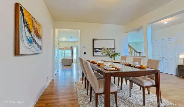 a kitchen with a refrigerator and sink