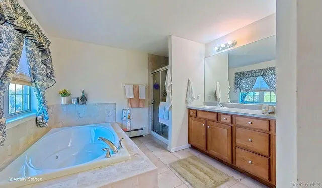 a view of backyard of house with green space